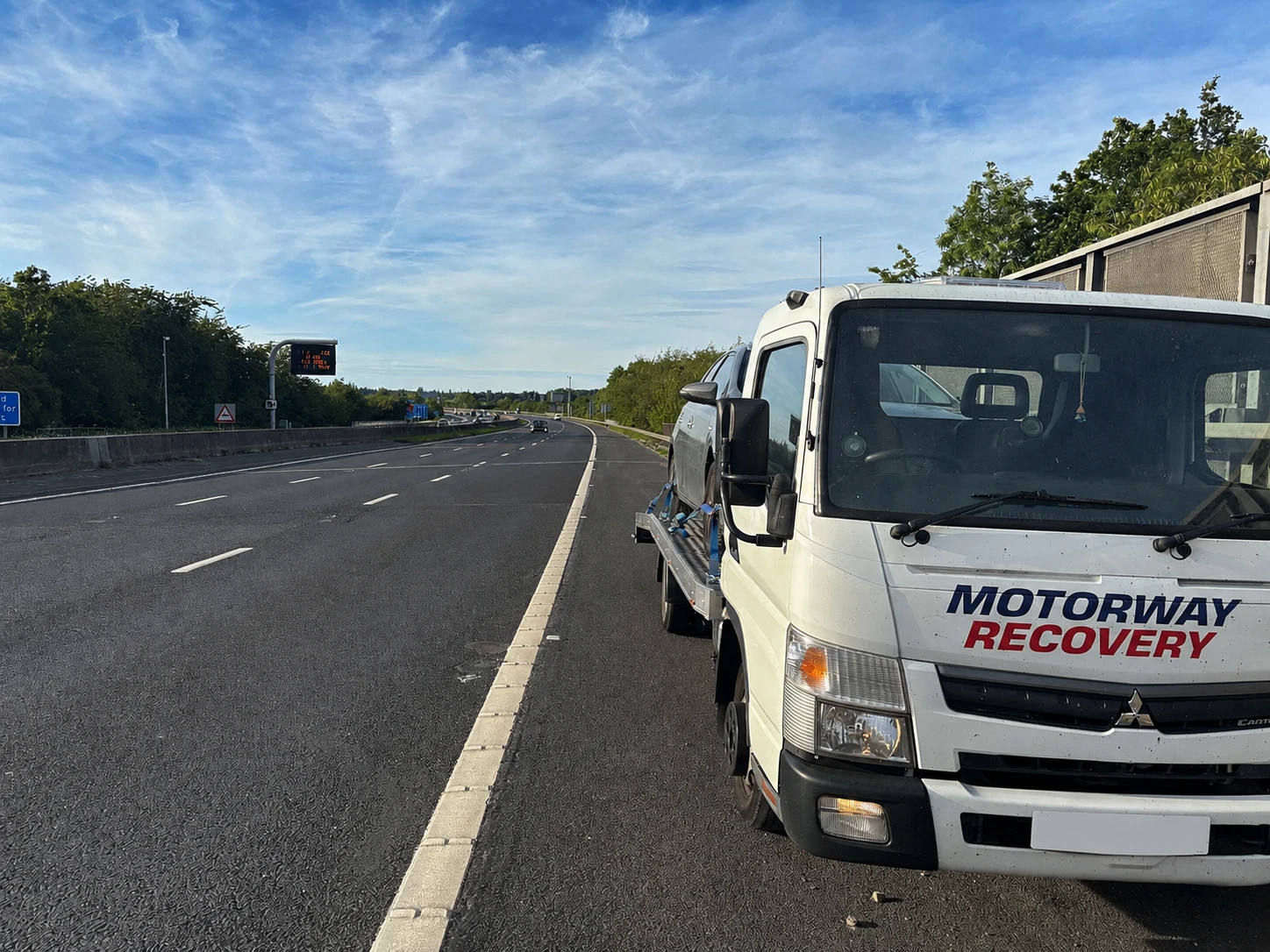 Hard shoulder recovery tow truck service UK motorway